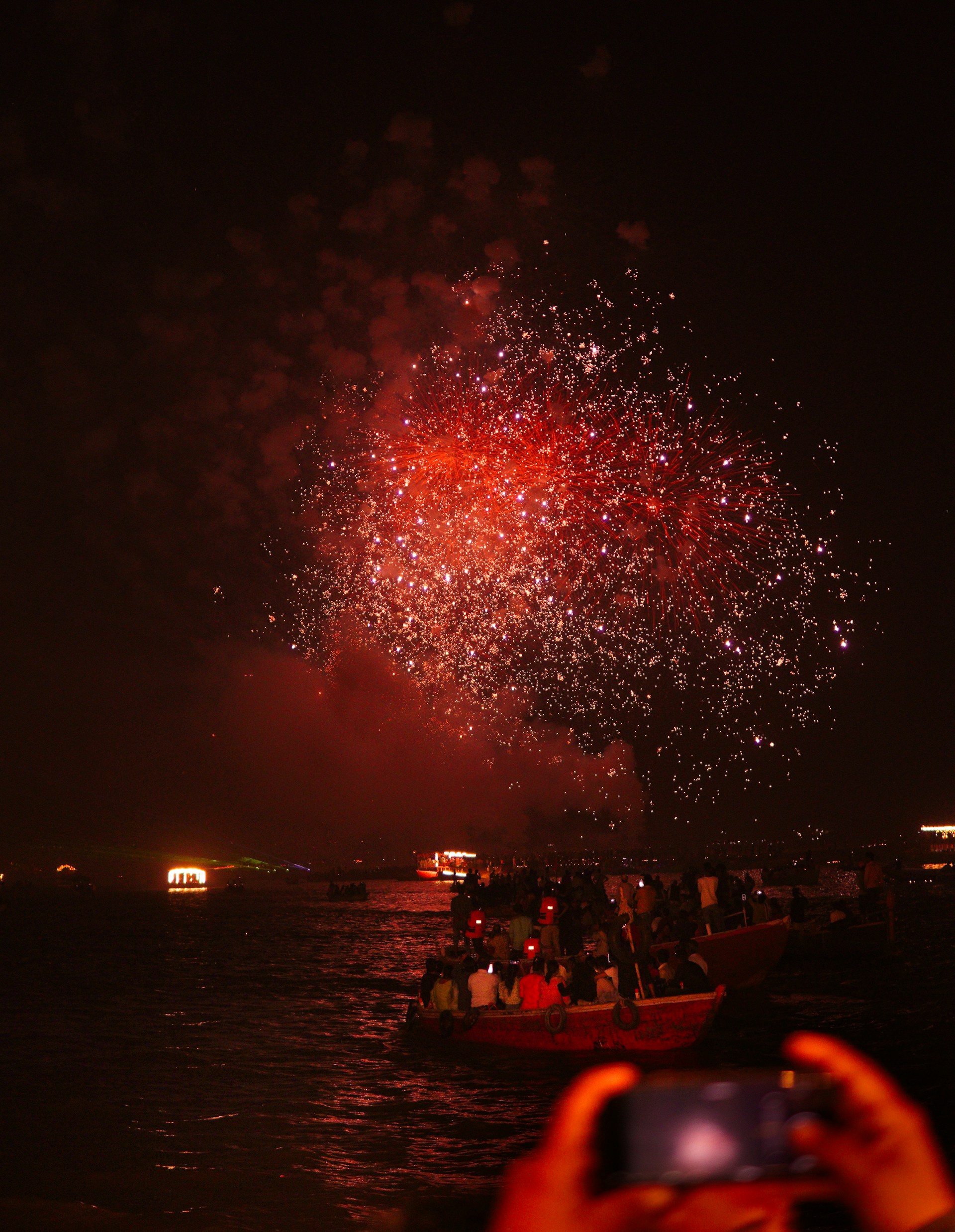 A million oil lamps glowing along the Varanasi ghats on the Ganga during Dev Diwali