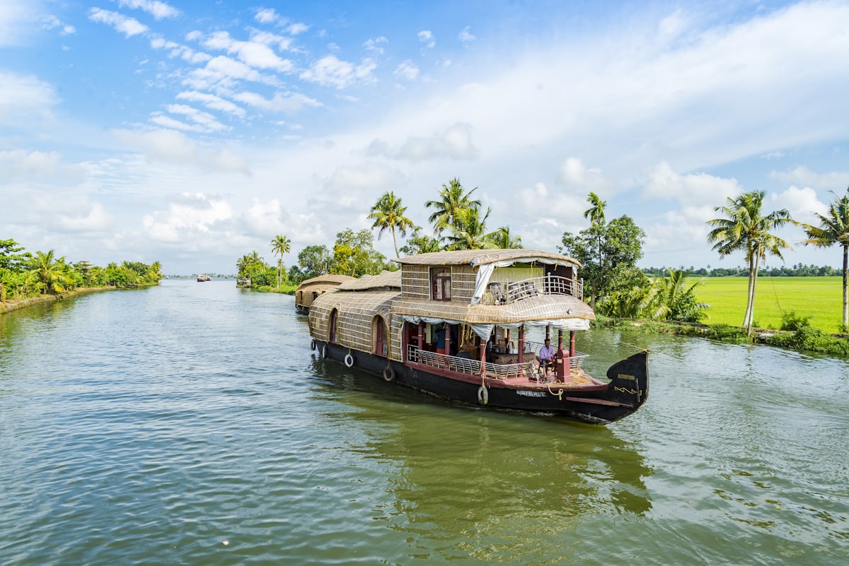 Kerala houseboat and snake boat race on the backwaters near Alleppey