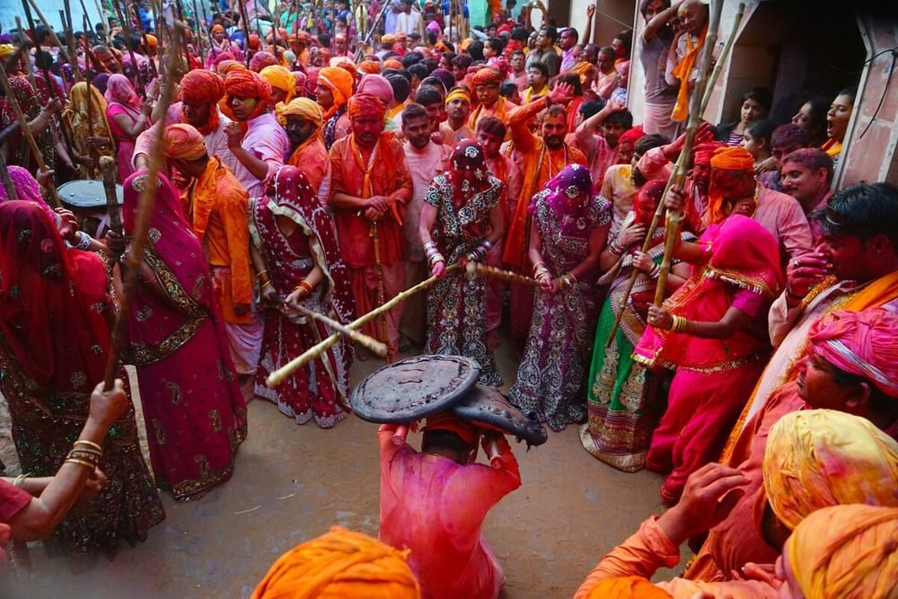 Villagers in Barsana/nandgaon playfully hitting men of other village.