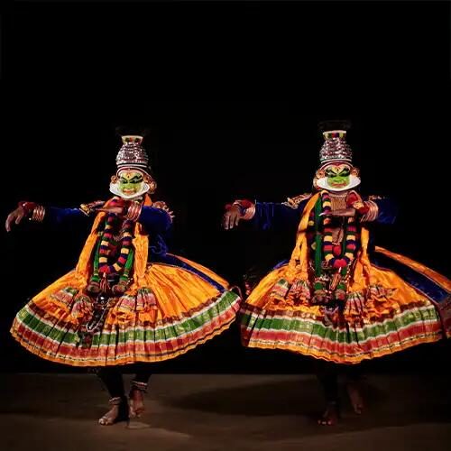 Kathakali performer in elaborate green makeup and costume, Kerala
